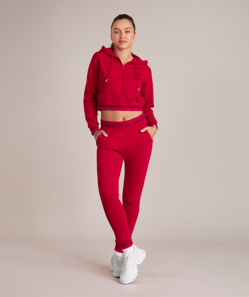 athletic crop top hoodie in red for women at gym