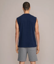 back view of man in navy blue gym tank