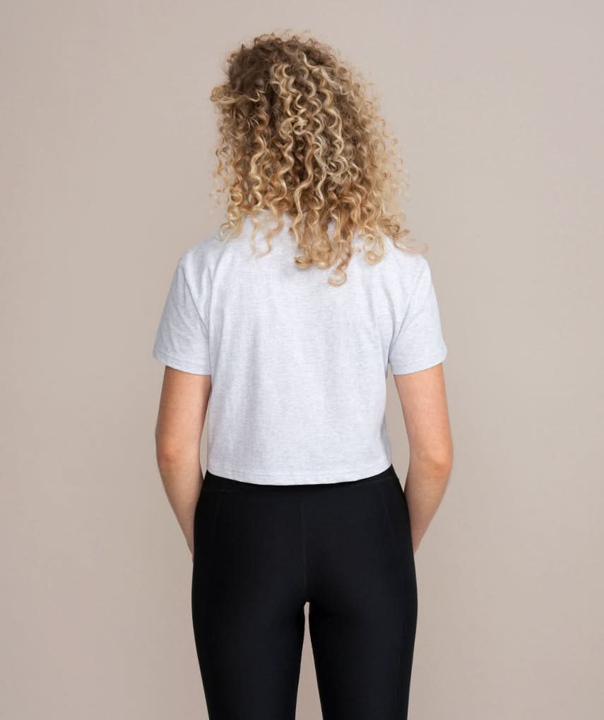 back view of woman wearing athletic outfit