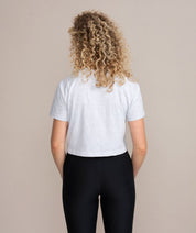 back view of woman wearing athletic outfit