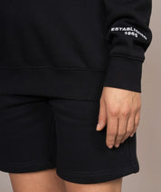 established 1965 golds gym sweater in black arm closeup
