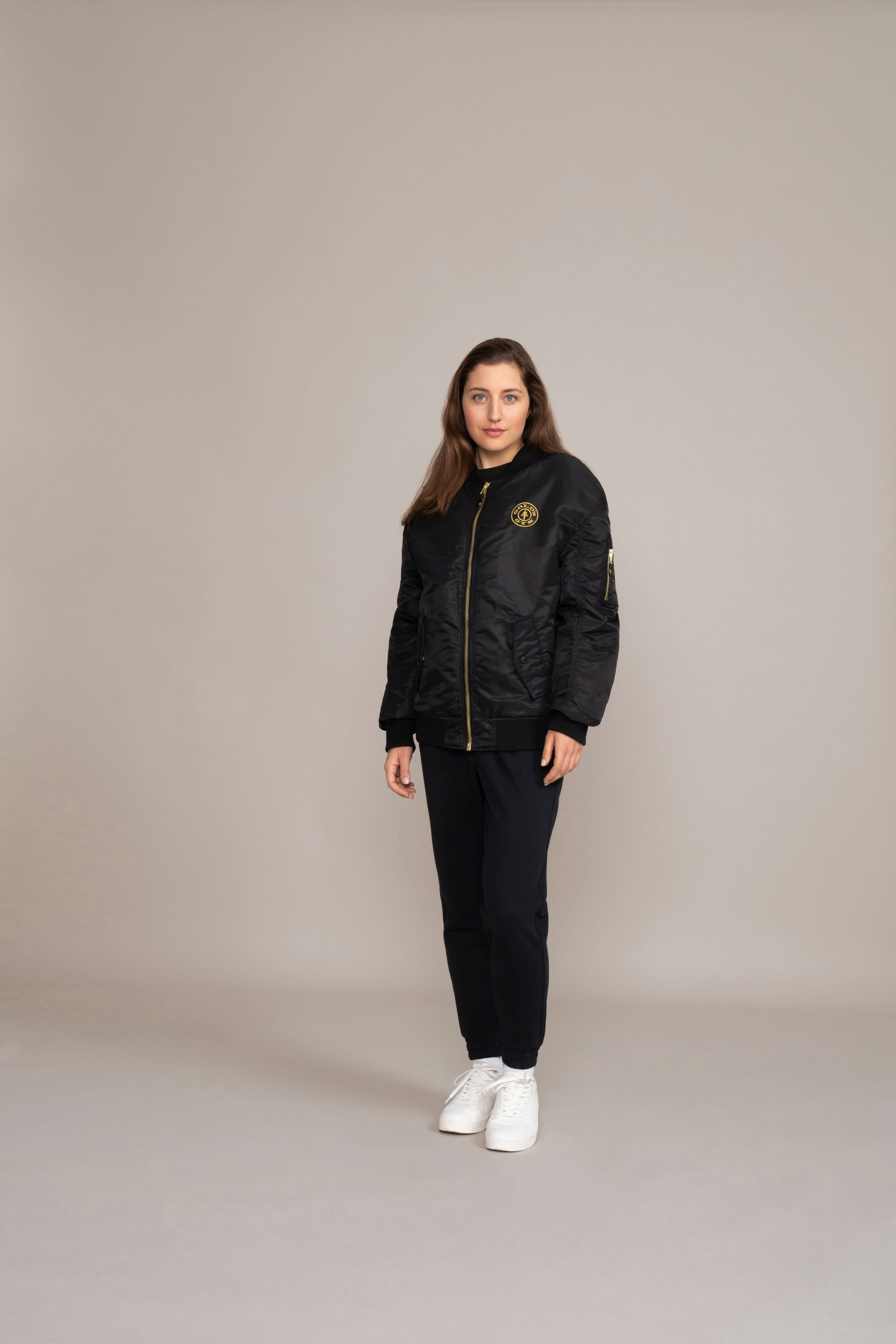 female in golds gym jacket