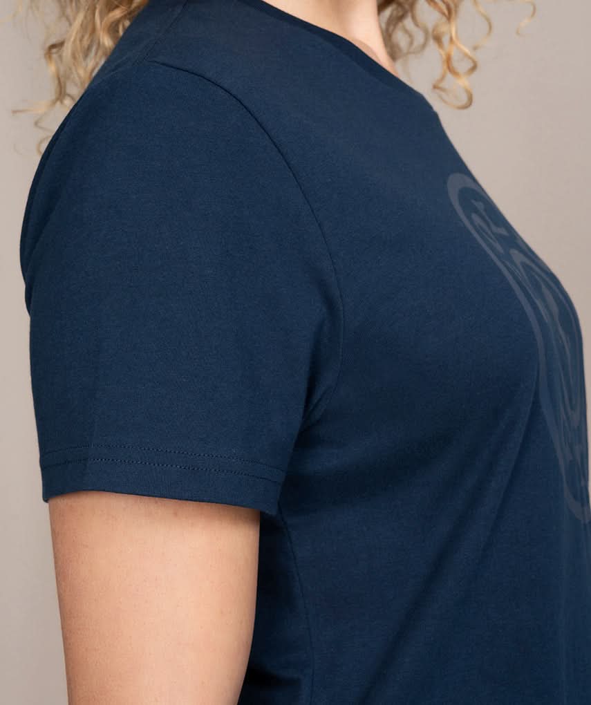 side view of woman in golds gym shirt