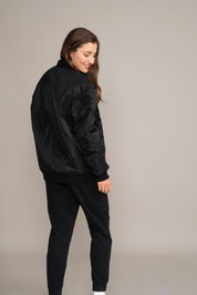 woman wearing bomber jacket