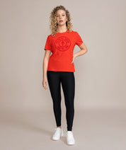 woman wearing red golds gym shirt