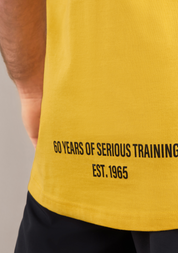 Gold's Gym - 70s Yellow Vintage Bodybuilder Stringer - (60th Anniversary Collection)