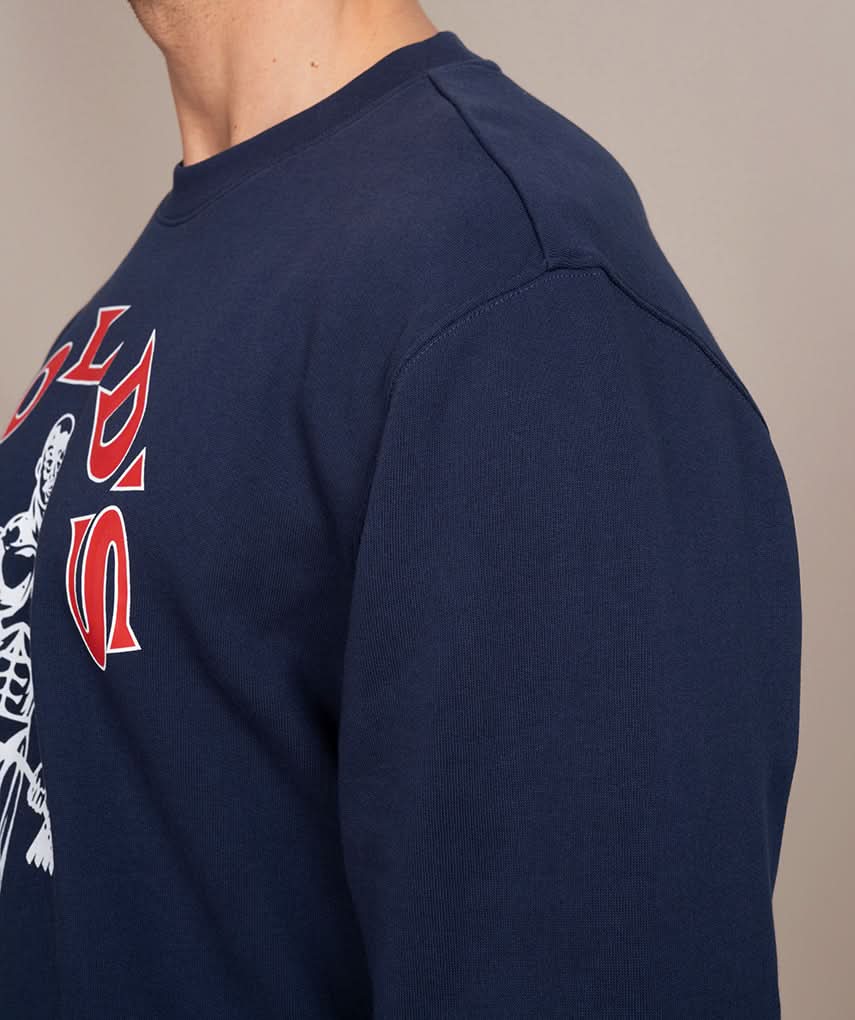 back side of blue navy and red logo golds gym sweater  side view 