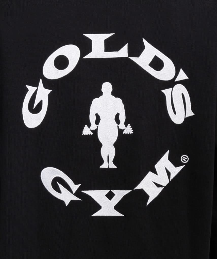 closeup of golds gym logo on black 