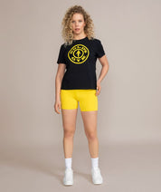 female model in golds gym black and gold shirt