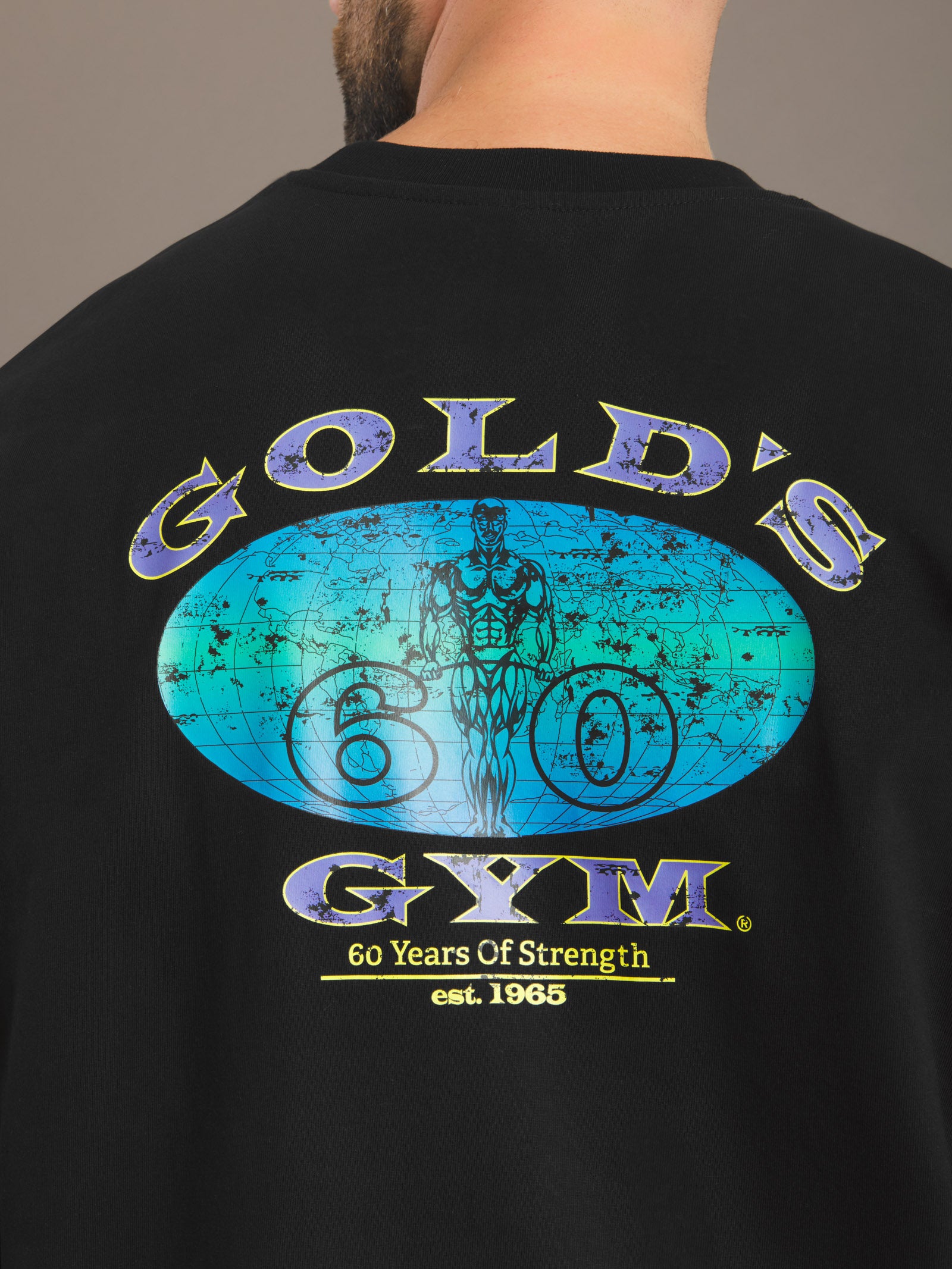 Black t-shirt with Gold's Gym logo on the back