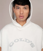 man in white golds gym hoodie