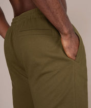 olive athletic gym shorts for men back side view