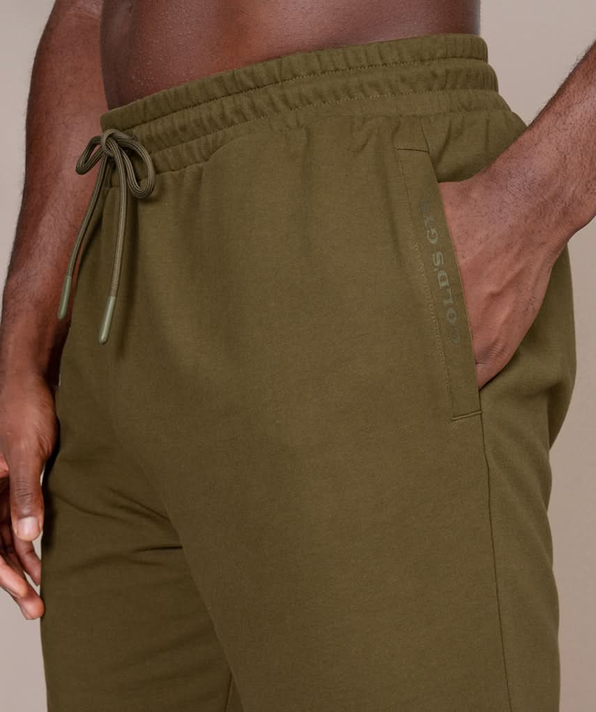 olive athletic gym shorts for men front side view