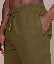 olive athletic gym shorts for men front side view
