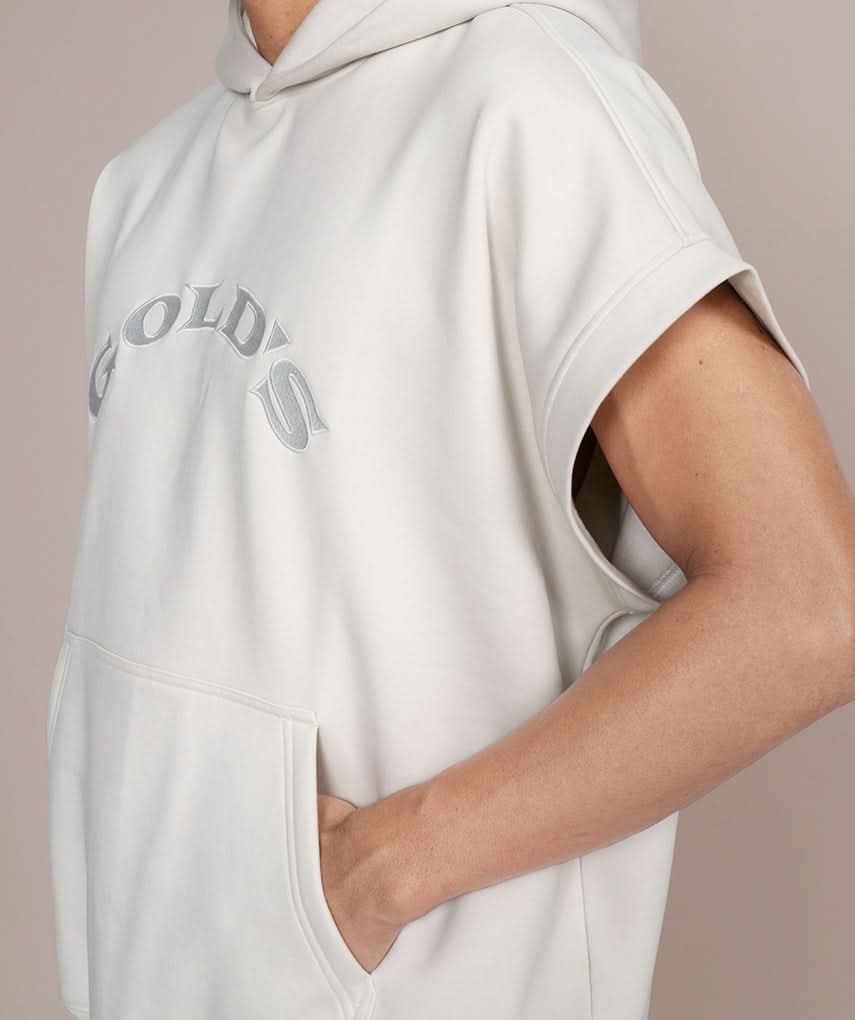 side view of oversized white sleeveless hoodie