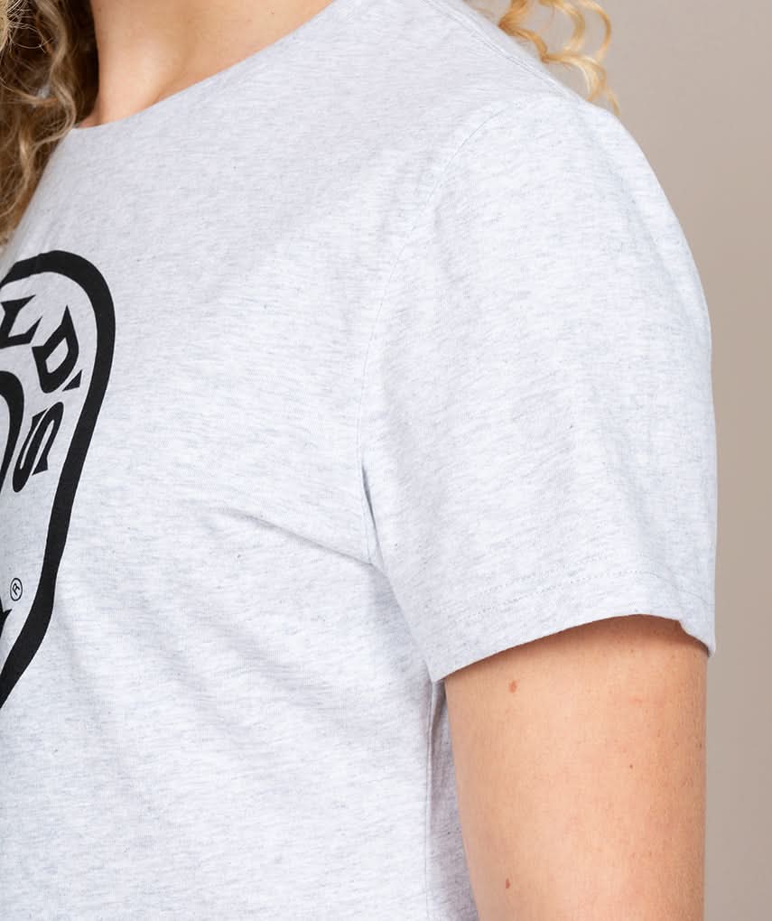 side view of woman in golds gym shirt gray