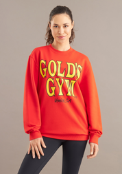 woman wearing golds gym red sweater 