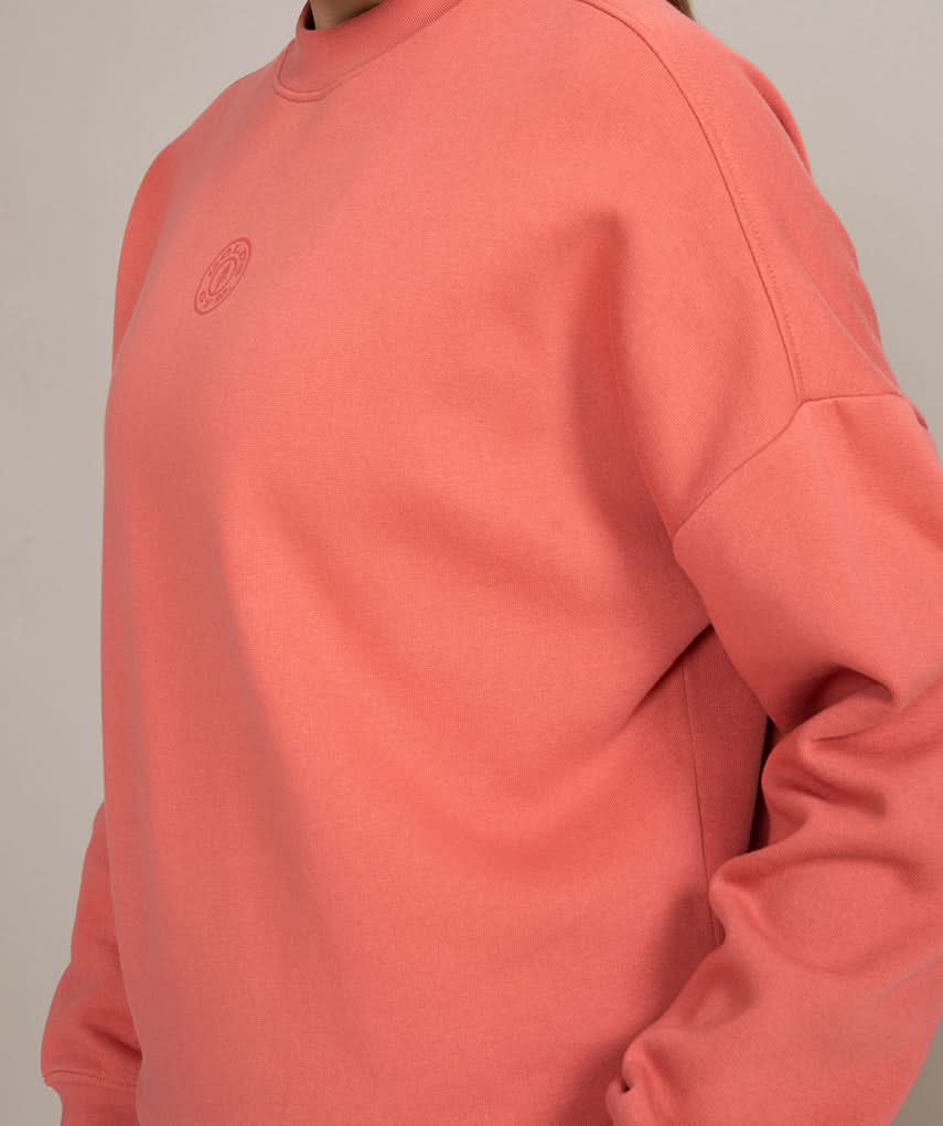 womens athletic sweater peach color luxury closeup